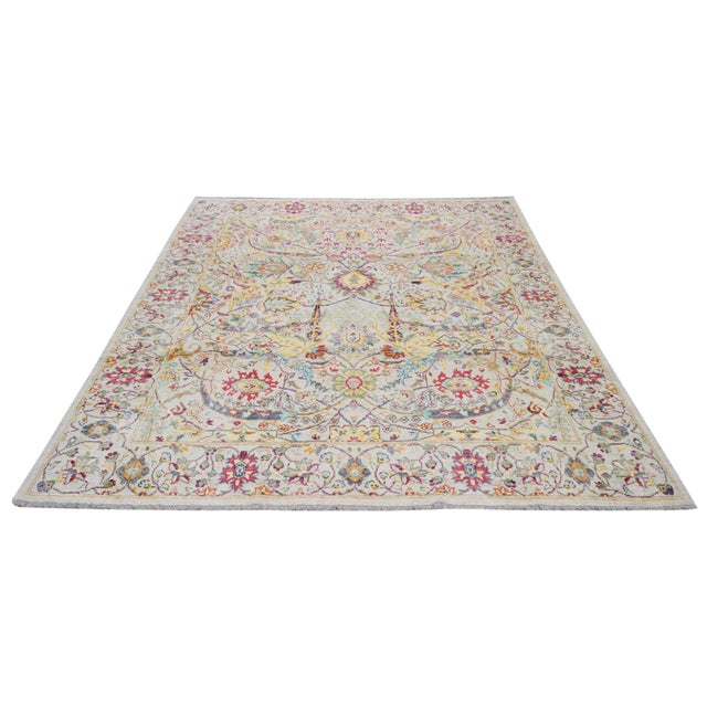 Hand-knotted with care using traditional rug-making techniques, this wool rug blends timeless craftsmanship with a modern...