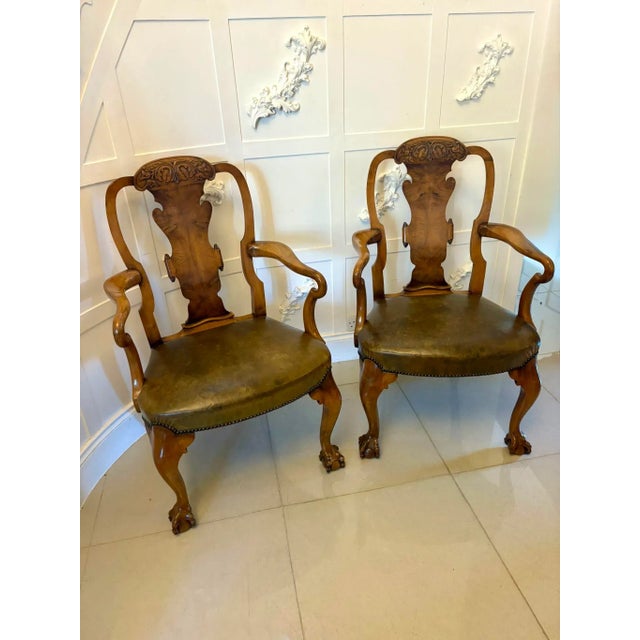 Outstanding quality pair of antique Victorian carved walnut desk chairs having an outstanding quality carved walnut shape...