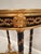Superbly elegant and opulent bronze & marble gueridon oval table having incredible ornate details. The black and gold...
