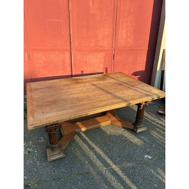 Stunning dining table, generously sized (large, inviting, and practical for meals), with many intricate wood carvings. A...