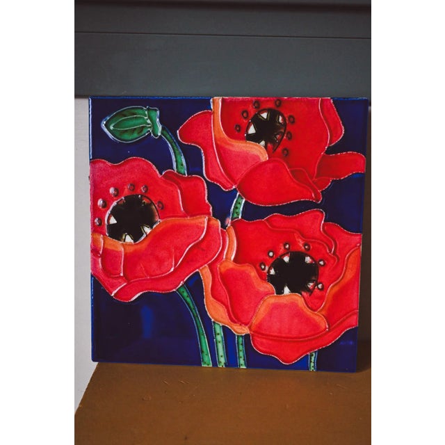 Gorgeous handcrafted tile featuring poppies. Made using the dry-laid rope technique. The colors are intense and vibrant;...