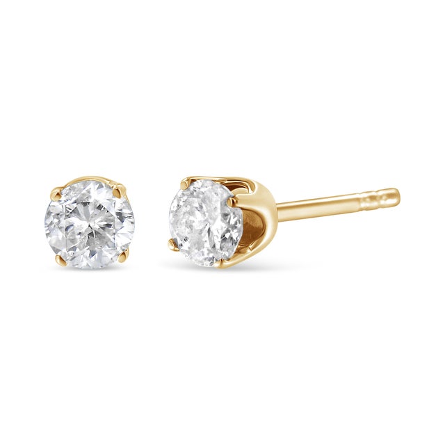 Celebrate any occasion with these classic shimmering diamond stud earrings. Crafted from 14k Yellow Gold each earring...