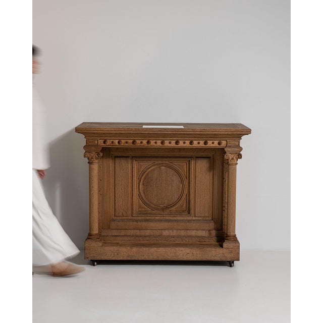 This piece presents as a cabinet, distinguished by natural honey oak, turned wood knob accents. Dating to 1900s and...
