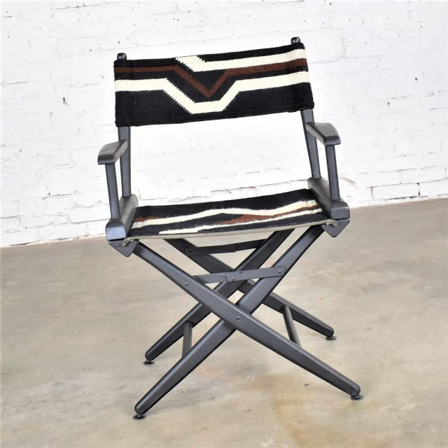 Awesome black wood folding director’s chair with a hand made black, brown, and white geometric pattern needlepoint sling...