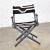 Awesome black wood folding director’s chair with a hand made black, brown, and white geometric pattern needlepoint sling...