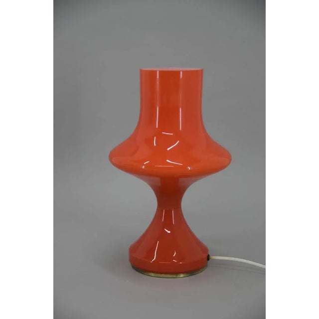 Red glass table lamp designed by stepan tabera for czechoslovakian company opp jihlava in early 1970s. Two layers of glass...