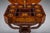 An elegant Biedermeier sewing work table crafted in richly figured mahogany and decorated with fine marquetry inlay,...