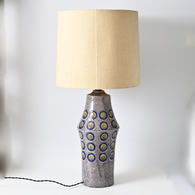 Given dimensions are with the lampshade. Dimensions without the lampshade: height: 53 cm, diameter: 21 cm. This piece has...