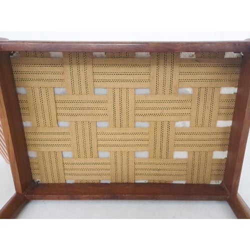 About this item Wooden foot stool with a loose cushion. The cushion cover can be zipped off and washed. The springs are in...