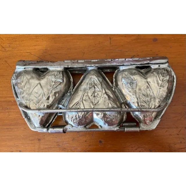 A rare find! Antique 'To My Valentine' 3 heart chocolate mold from renowned German mold maker Anton Reiche. the mold has...