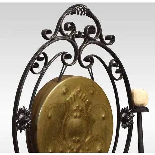 Art Nouveau cast Iron dinner gong the decorative Fram with flower heads and scrolling decoration. Supporting the original...