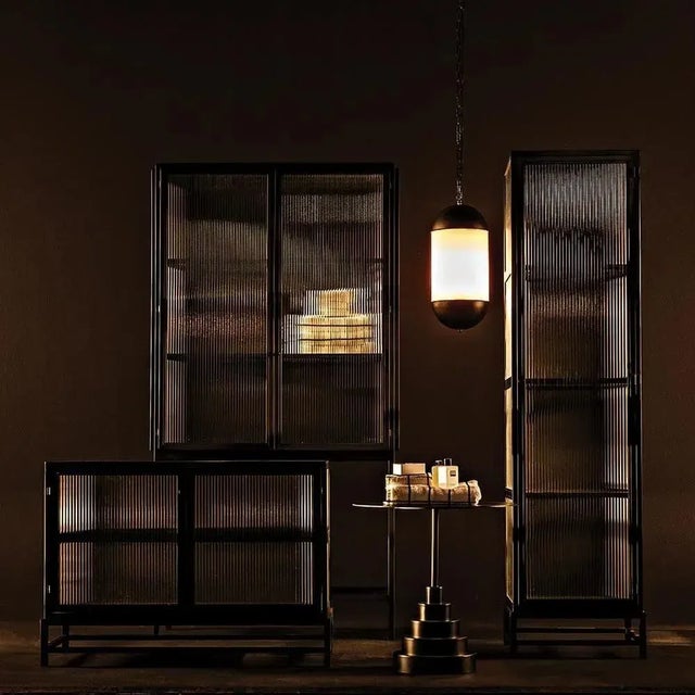 The Chandler Sideboard measures 41 inches in width, 19.5 inches in depth, and 30 inches in height. It features two doors...