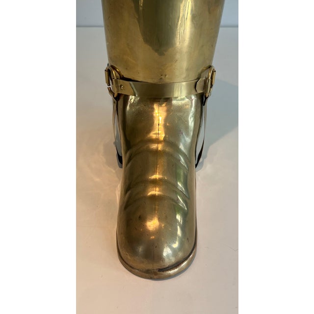 This very beautiful and unusual umbrella stand representing a boot is made of brass. It is a French work. Circa 1900