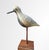 A beautifully hand-carved Black-Bellied Plover by acclaimed American bird and decoy carver Mark S. McNair. Signed on the...