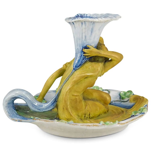A beautifully modeled Austrian Art Nouveau figural chamberstick by Ernst Wahliss, Turn-Teplitz, circa 1897–1906. The...