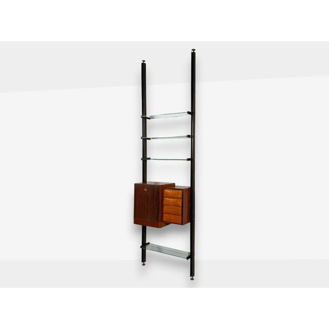 Italian Mid-Century Modern, Floor to Ceiling Bookcase or Shelving Unit, Stained Wood, Glass, Italy, 1940s A stained wood,...
