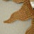Sun Burst Mirror by Mario Lopez Torres. There are minor imperfections to the hand-made woven rattan. Signed Mario Lopez...