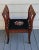 This antique high armed bench makes a great one person seat that is portable and beautiful. It can serve as an extra seat...