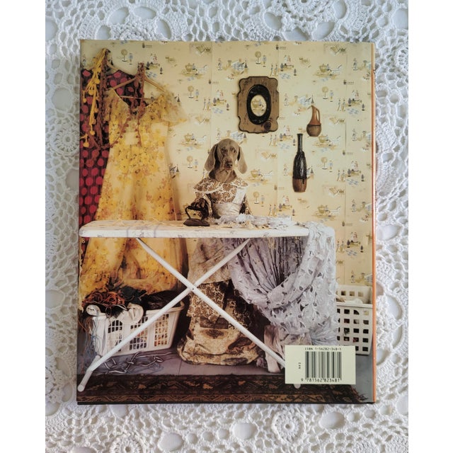 Cinderella by art photographer William Wegman, measuring 11 ¼” x 9 ¼” x ½. This classic story has a silly spin featuring...