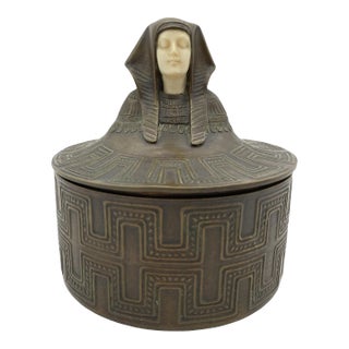 Egyptian Revival Bronze Round Pharaoh Case With Carved Bone Face, 1920 For Sale