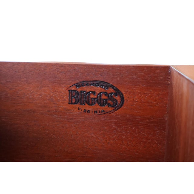 A finely crafted mid-20th-century mahogany bachelor’s chest by Biggs Furniture of Richmond, Virginia, circa 1950s–1970s....