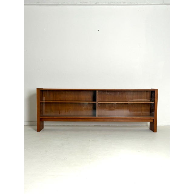 Skovby Møbelfabrik Teak Display Cabinet, Denmark, 1960s An elegant long and low teak display cabinet produced by Skovby...