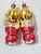A pair of vintage German glass Christmas ornaments featuring kneeling angels with hands clasped in prayer. Each wears a...