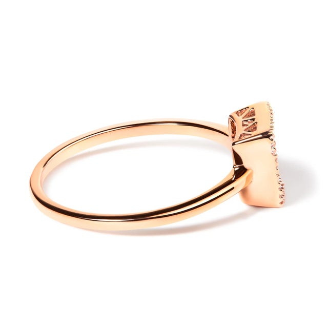 Add shimmer to any look with this eye-catching diamond ring. Fashioned in rich 10K rose gold, this striking style...
