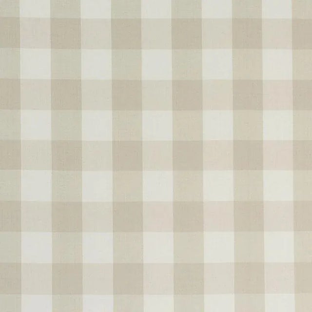 A classic one and a half-inch buffalo check, this woven cotton is a wonderful complement to both prints and plains. Sold...