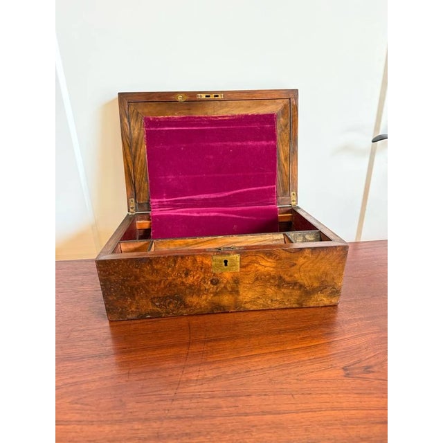 Beautifully inlaid and a wonderful colour, this box will look amazing wherever you put it. The colour of the burr walnut...