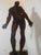 Antique anatomical model of the human body on a pedestal. The lymphatic system, nervous system, and muscles are depicted....