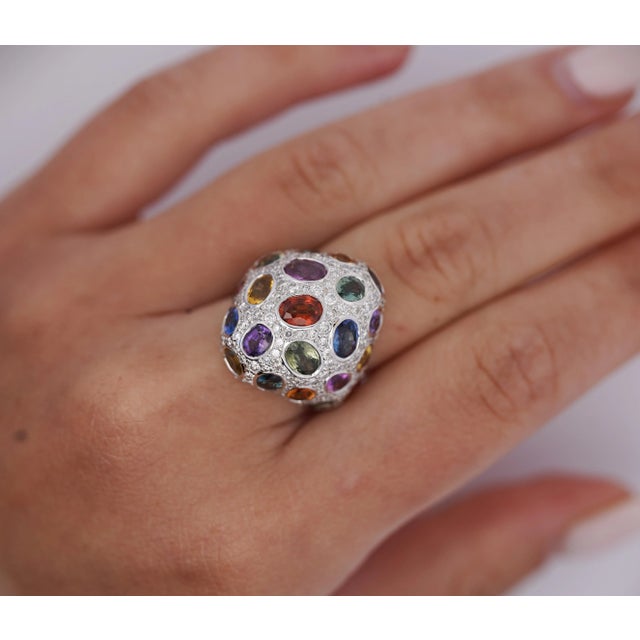 Mix Colored Sapphire, Amethyst, Garnet, Diamond Cluster Ring. This dome ring features a mixture of colors and gemstones....