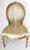 A pair of antique, late 18th-century, c. 1780 French side chairs, with oval balloon backs, carved floral designs at top...