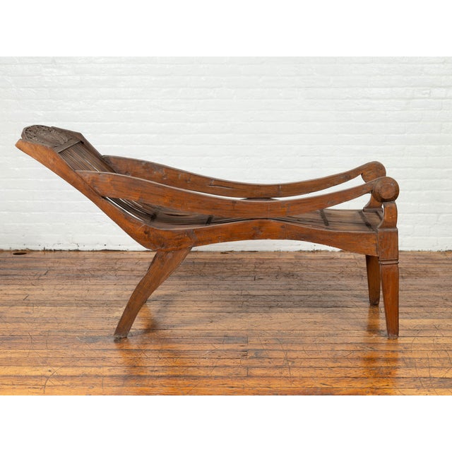 Wood Antique Indonesian Reclining Plantation Chair with Bamboo Slats and Carved Décor For Sale - Image 7 of 10