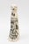 This very arresting and conversational tall ceramic sculpture is of female figure adorned wth abstract designs has great...