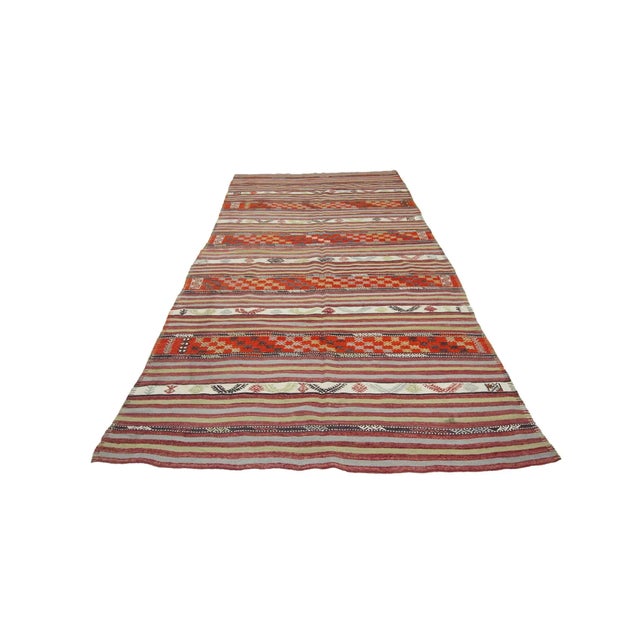 Handwoven vintage kilim rug from Denizli region of Turkey.Approximately 45-55 years old. In good condition.