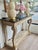 Make a statement with this vintage console table from the 30's, featuring a beautiful solid wood base with stunning...