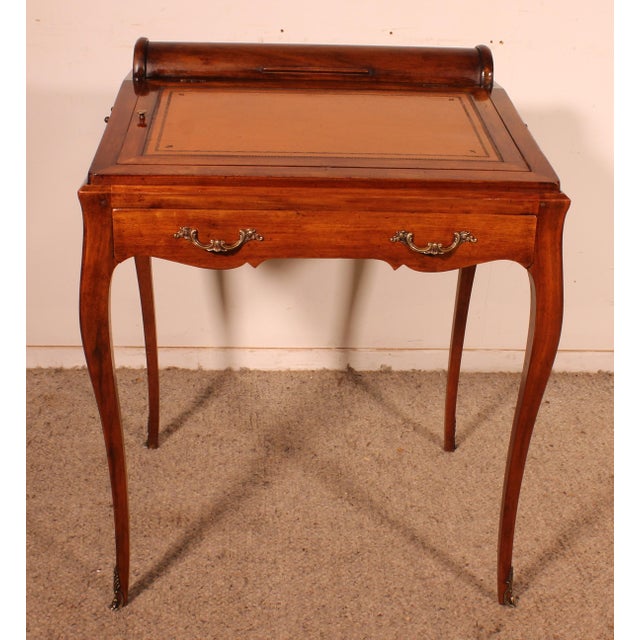 Exquisite and rare Napoleon III period walnut desk that converts into a games table. This charming little writing desk is...