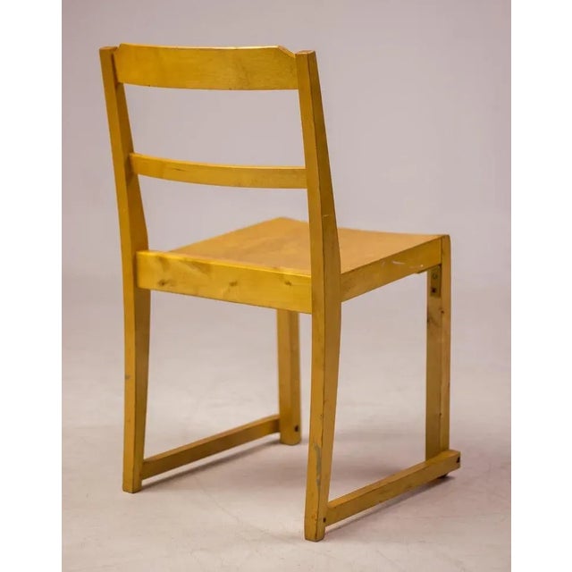 Set of six stacking chairs in birch designed by the Swedish architect Sven Markelius. Manufactured by Bodafors for the...