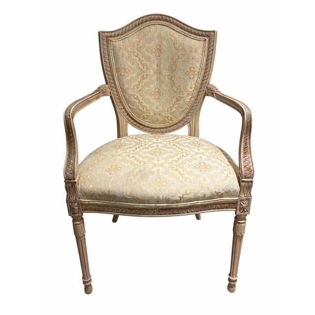 Bring timeless European elegance into your space with this exquisite pair of French Neoclassical style shield-back...