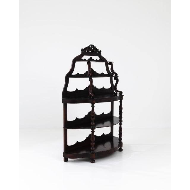 Combining an ornate composition with a rich patina, this antique set of shelves offers a covetable period piece. Built in...