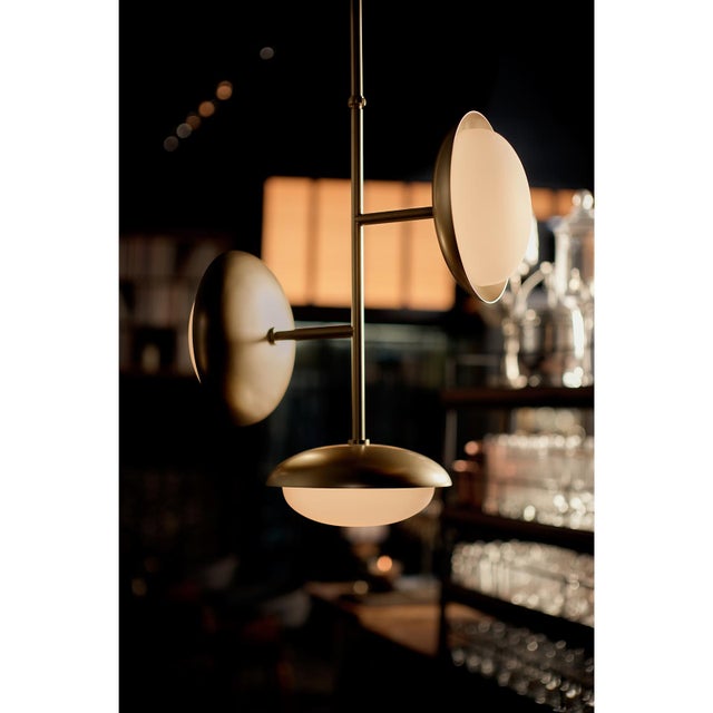 The Bond 3-Light Pendant distills the collection’s sculptural language into a vertical expression of proportion and poise....