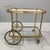 This very nice neoclassical style bar cart is made of silvered brass. Message for more details or delivery!