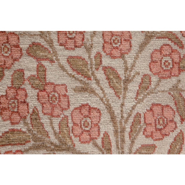 This somewhat unusual turn-of-the-century antique Tabriz Persian rug features a multicolor stepped field design containing...