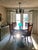 Crafted by Weiman, this table features a striking octagonal top with a beautifully matched sunburst top, resting on a...