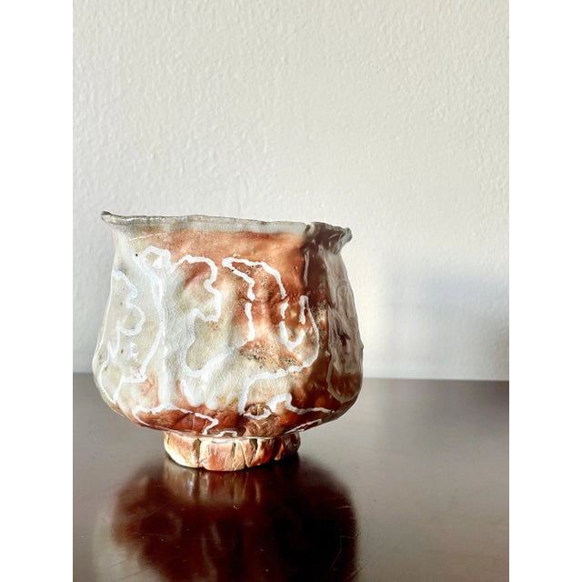 Beautifully painted and glazed hand-sculpted bowl. Terracotta and creamy white hues with a crackle glaze, asymmetrical...