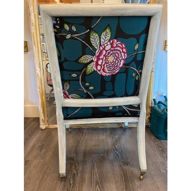 Restyled Vintage Arm chair painted in white with soft green patina and newly upholstered in Osborne and Little Christian...