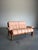 Vintage 1970’s Norwegian 2 seat sofa loveseat by Ekornes, the ‘Montana’ model. Sculptural solid teak frame with pale peach...