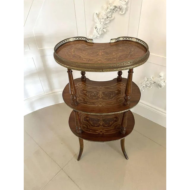 Quality French antique marquetry étagère boasting a pierced gilt gallery with a very elegant and beautifully designed...