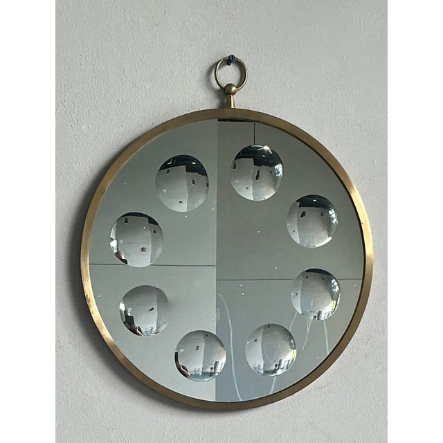 Presenting a captivating vintage Italian mirror, artfully designed in the spirit of Piero Fornasetti's iconic and...